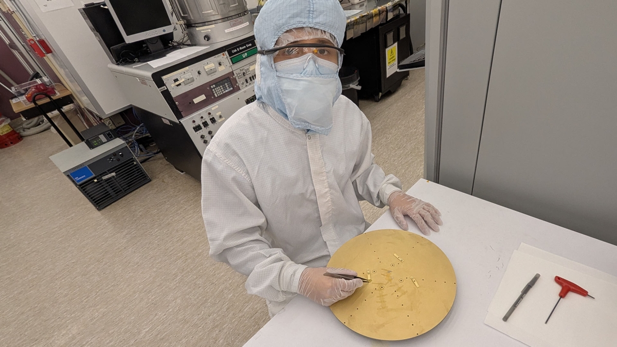 David McComas, an undergraduate electrical engineering student in the Ira A. Fulton Schools of Engineering at Arizona State University, deposits a metal mask on a gallium oxide wafer in the ASU NanoFab semiconductor fabrication facility. McComas is working on a Fulton Undergraduate Research Initiative, or FURI, project to improve microelectronics sustainability, one of eight FURI projects sponsored by semiconductor manufacturer TSMC in the fall semester. Photo courtesy of David McComas